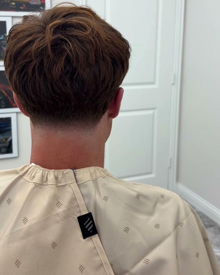 Back view of a small taper with a light trim on top